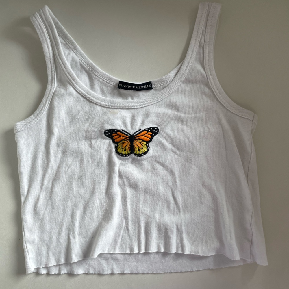 preppy and beautiful crop top, small unoticable stain on the front, un worn.